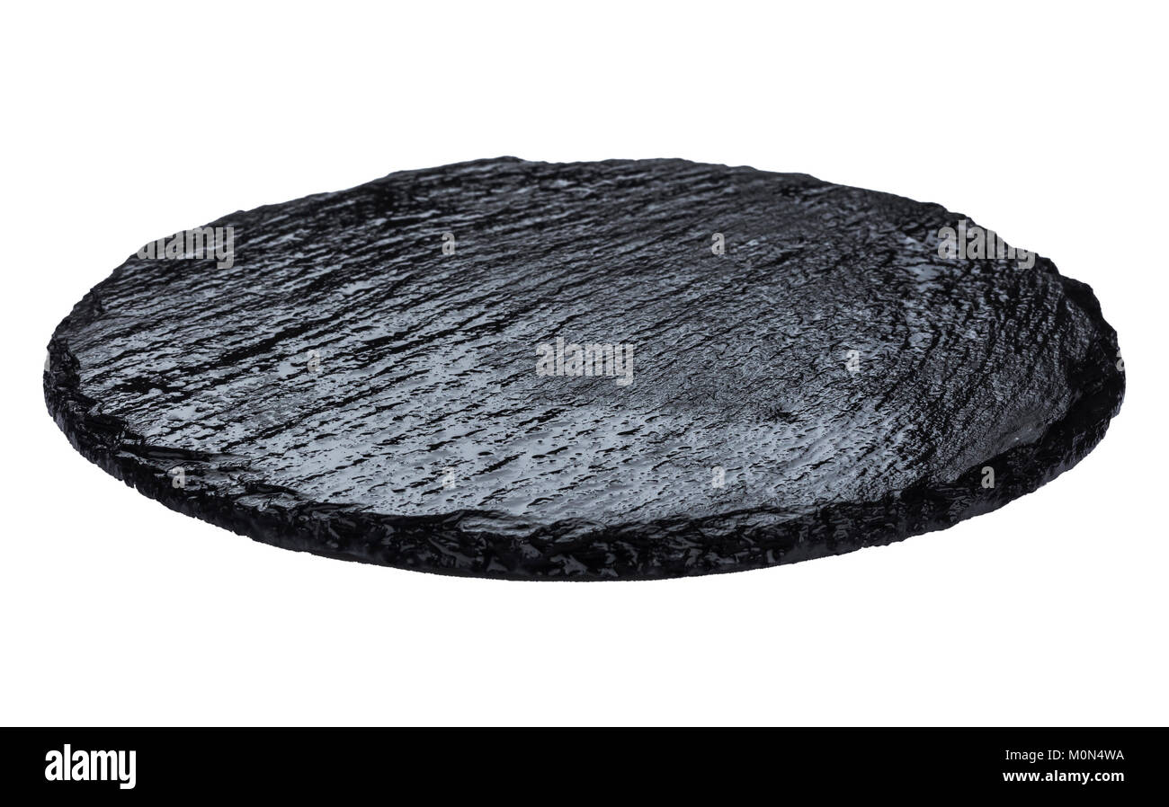 Platte aus schwarzem Schiefer isoliert auf weißem Hintergrund Stockfoto
