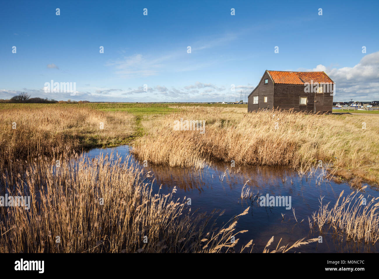 Holzbauten auf dem Fluss, Walberswick, Suffolk UK Stockfoto