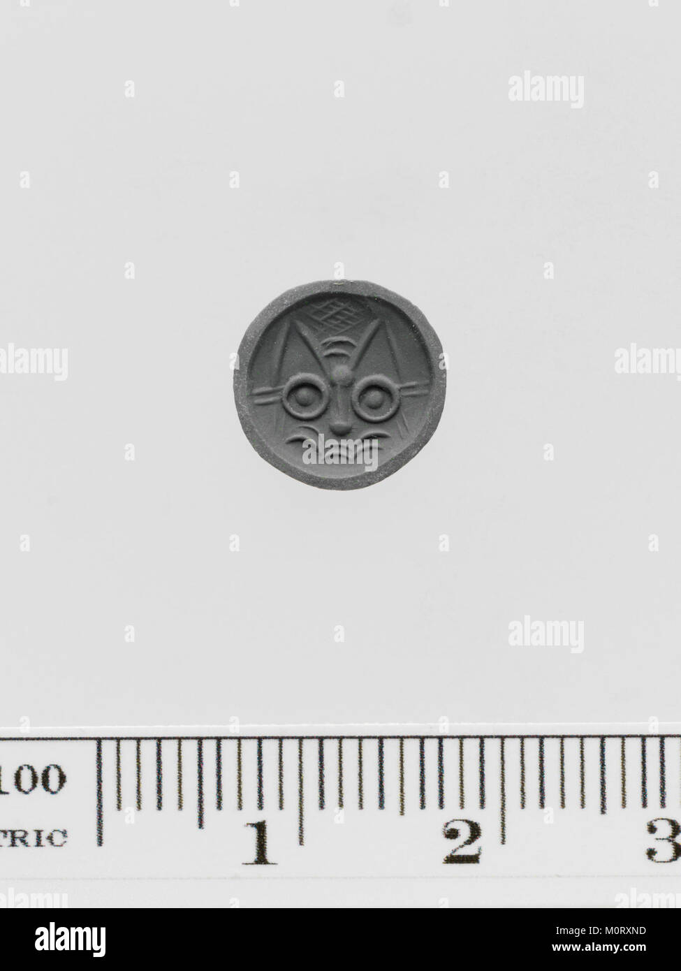 Karneol-Stempelsiegel aus der Sammlung des Metropolitan Museum of Art, mit gravierten Motiven und historischer Bedeutung. Stockfoto