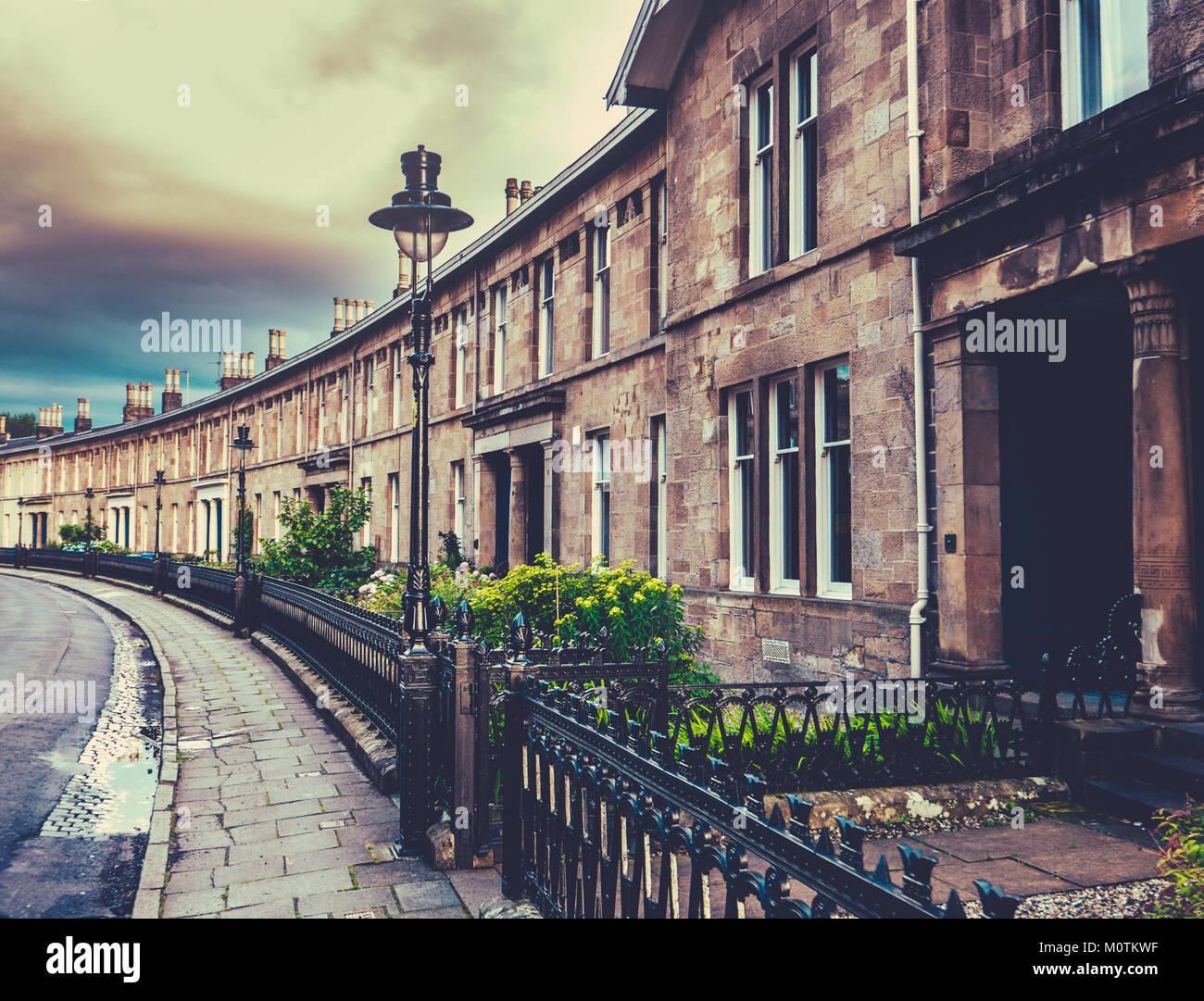 Schöne geschwungene Edwardian Reihenhäuser in einer britischen Stadt (Glasgow) Stockfoto