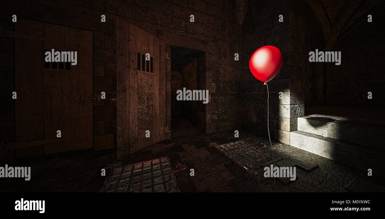 Red Balloon floating in dunklen Dungeon Stockfoto