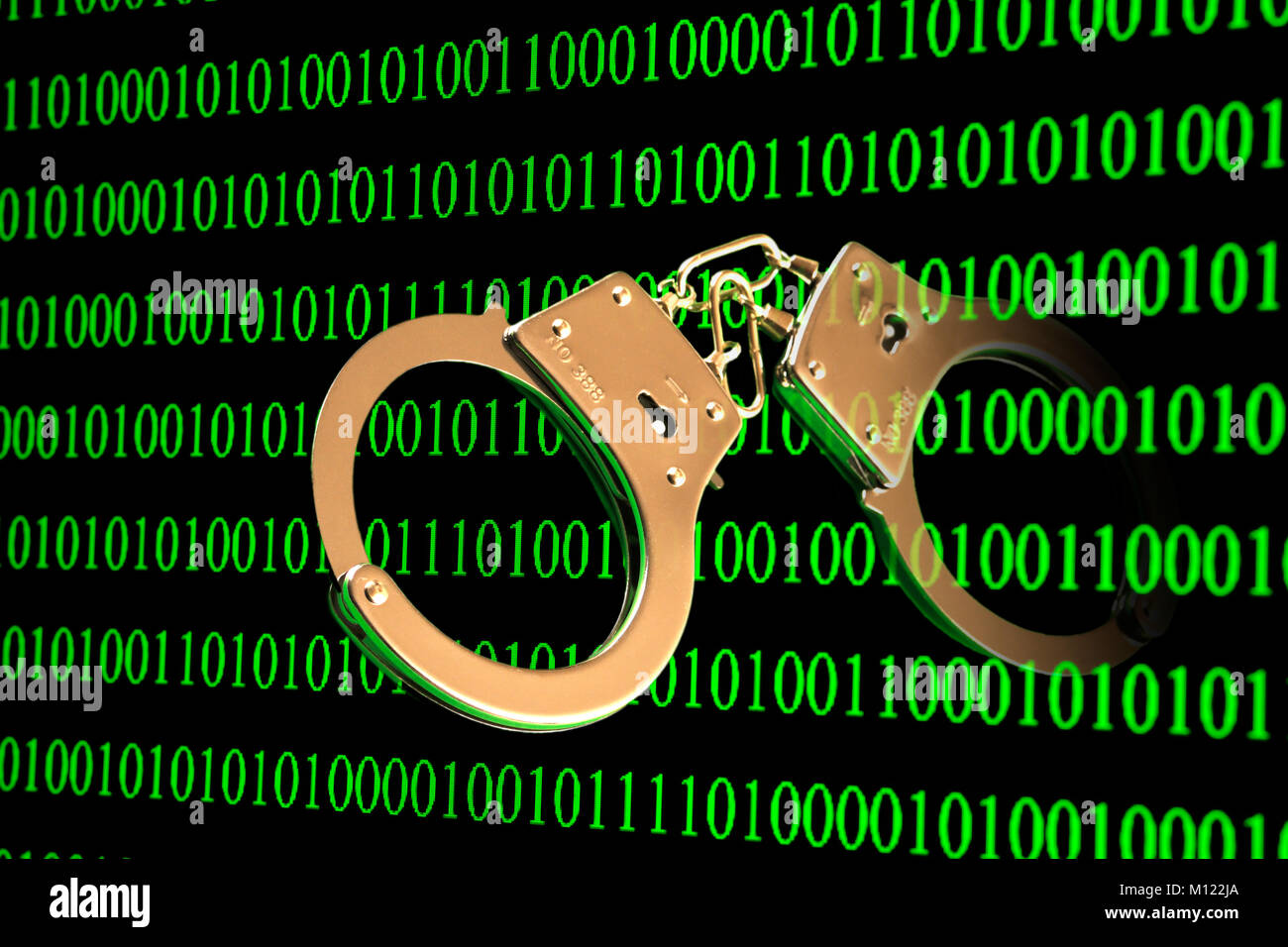 Handschellen mit binären Code, Symbol Bild von Computer kriminalität Stockfoto