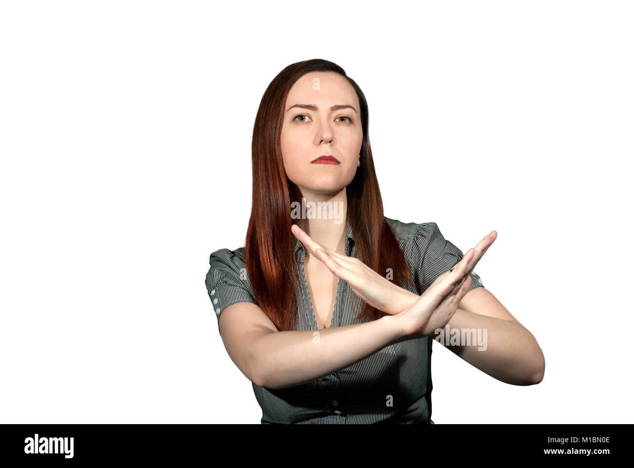 Frau auf einem weißen Hintergrund verschränkte die Arme in einem verbietet, Geste Stockfoto