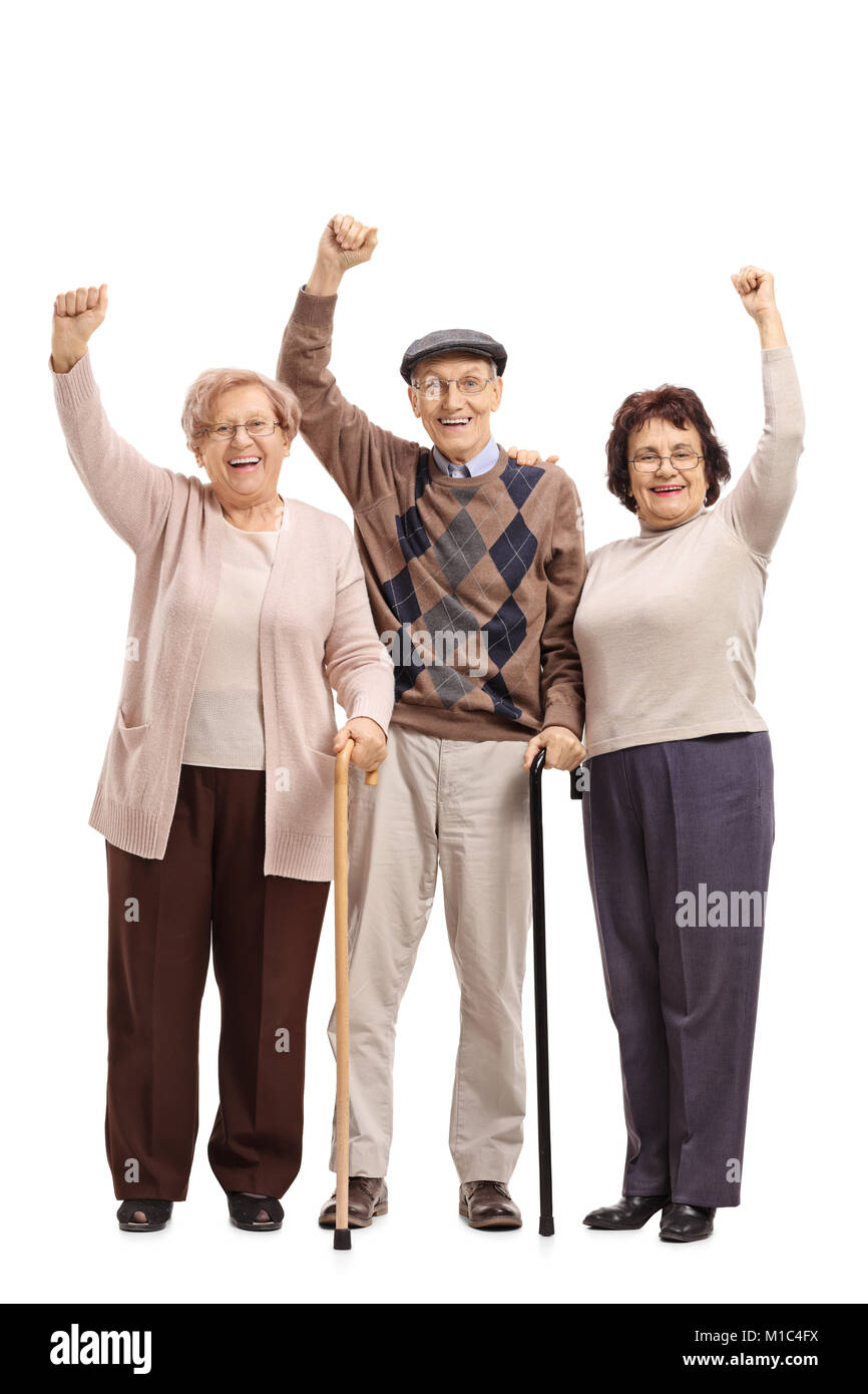 In voller Länge Porträt von drei fröhliche seniors ihre Hände halten bis auf weißem Hintergrund Stockfoto