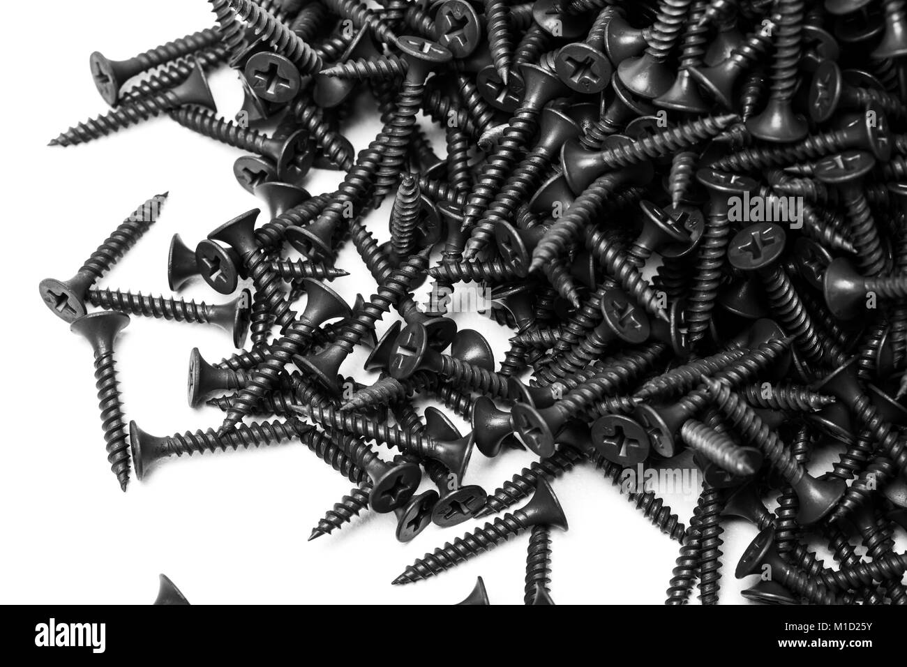 Gruppe von schwarzen Schrauben für die Befestigung von Gipskartonplatten auf Metallprofilen, Buchstabe A graviert Stockfoto