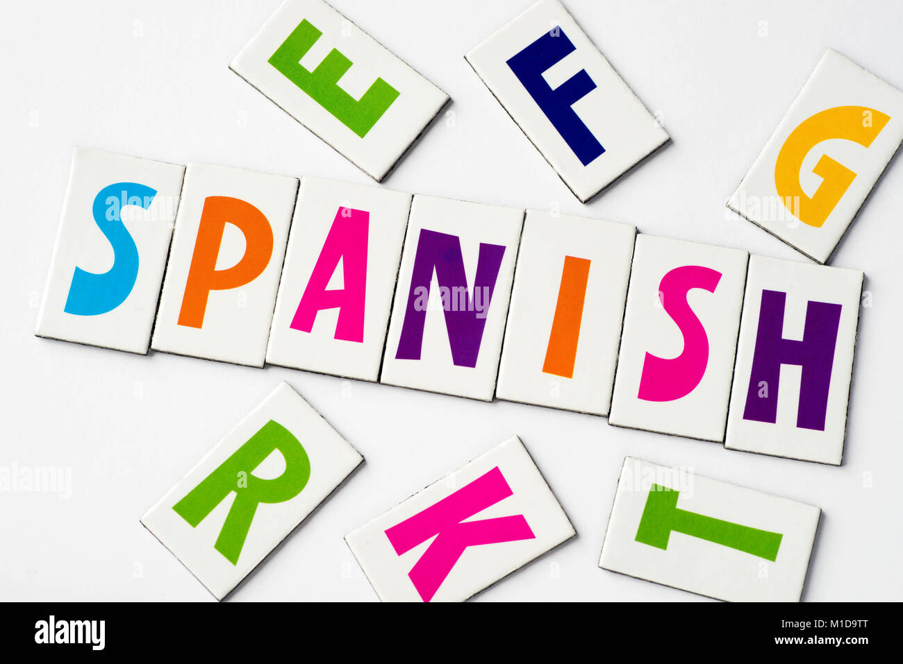 Wort Spanisch aus bunte Buchstaben auf weißem Hintergrund Stockfoto
