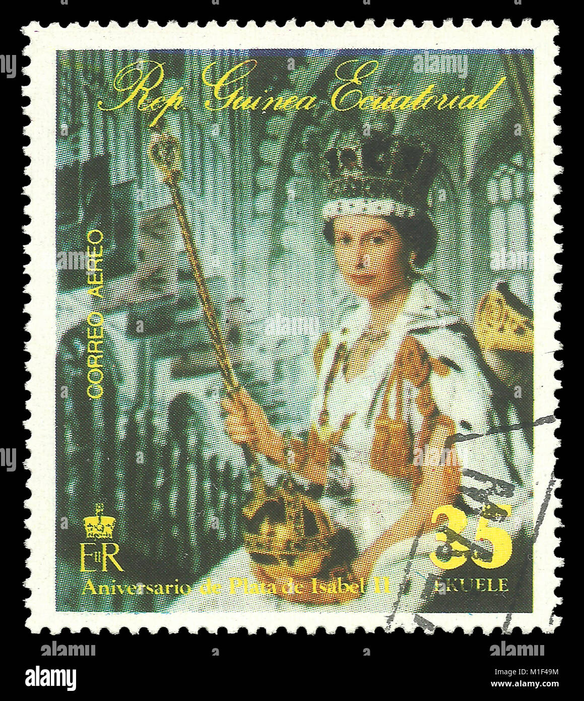 Äquatorialguinea - Stempel 1977: Colour Edition am 25 Krönung Jubiläum, zeigt Queen Elizabeth II mit Symbolen der Lizenzgebühren Stockfoto