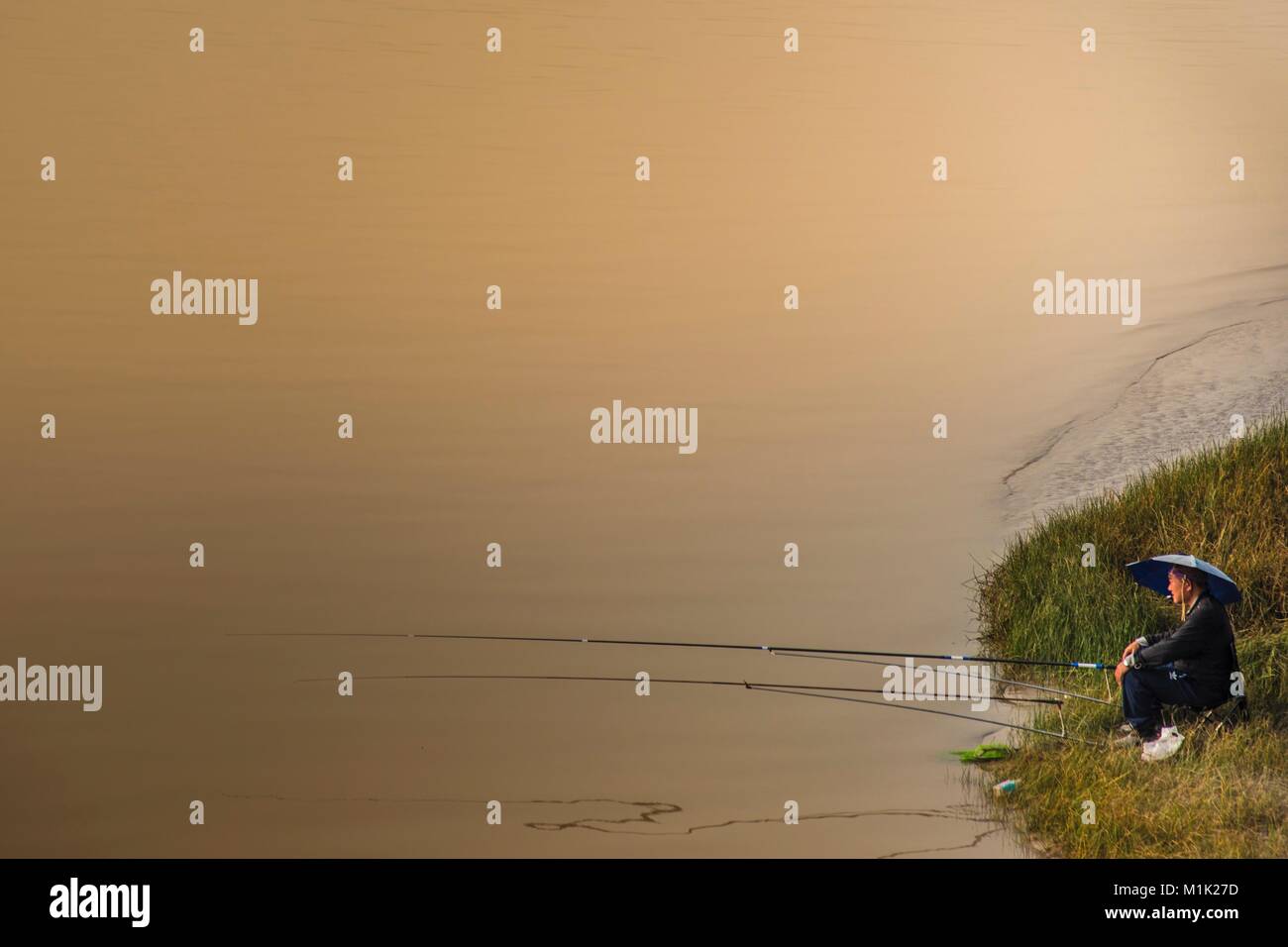 Angeln in der Einsamkeit Stockfoto