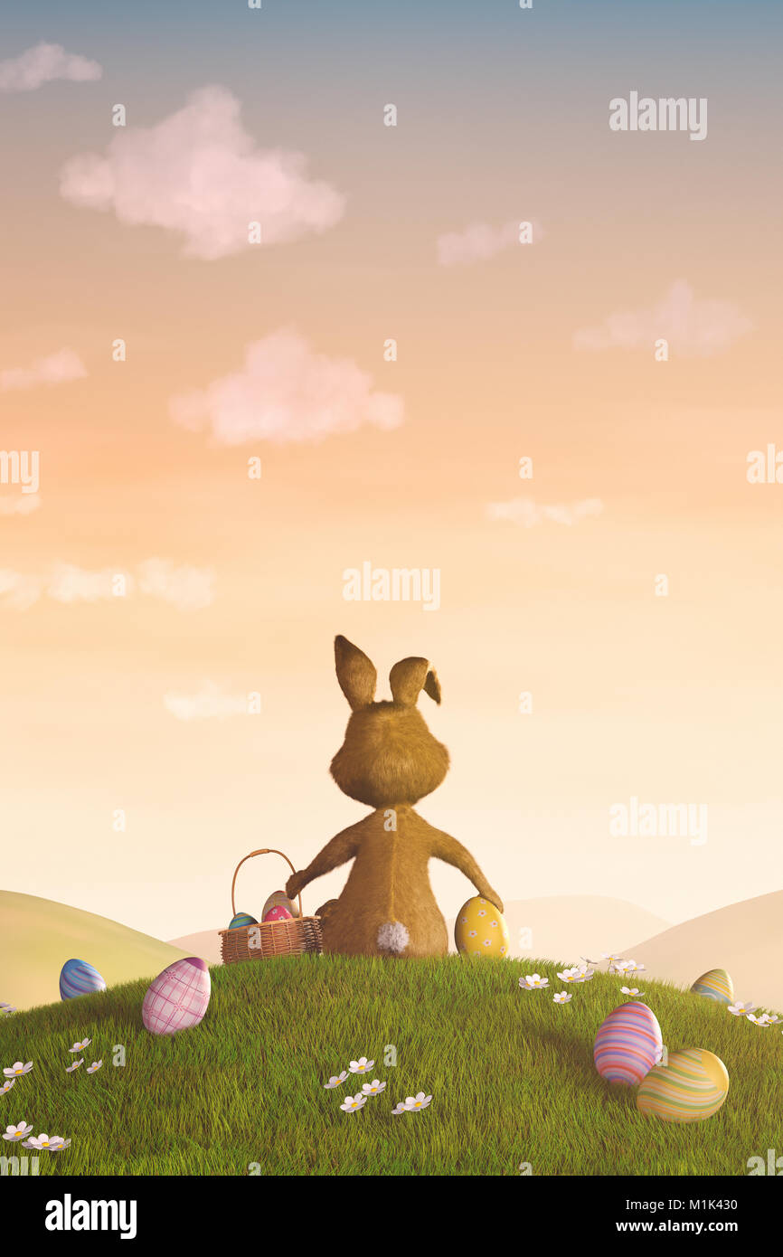 Eine niedliche Osterhasen sitzt auf einem Hügel umgeben von Ostereiern. Stockfoto