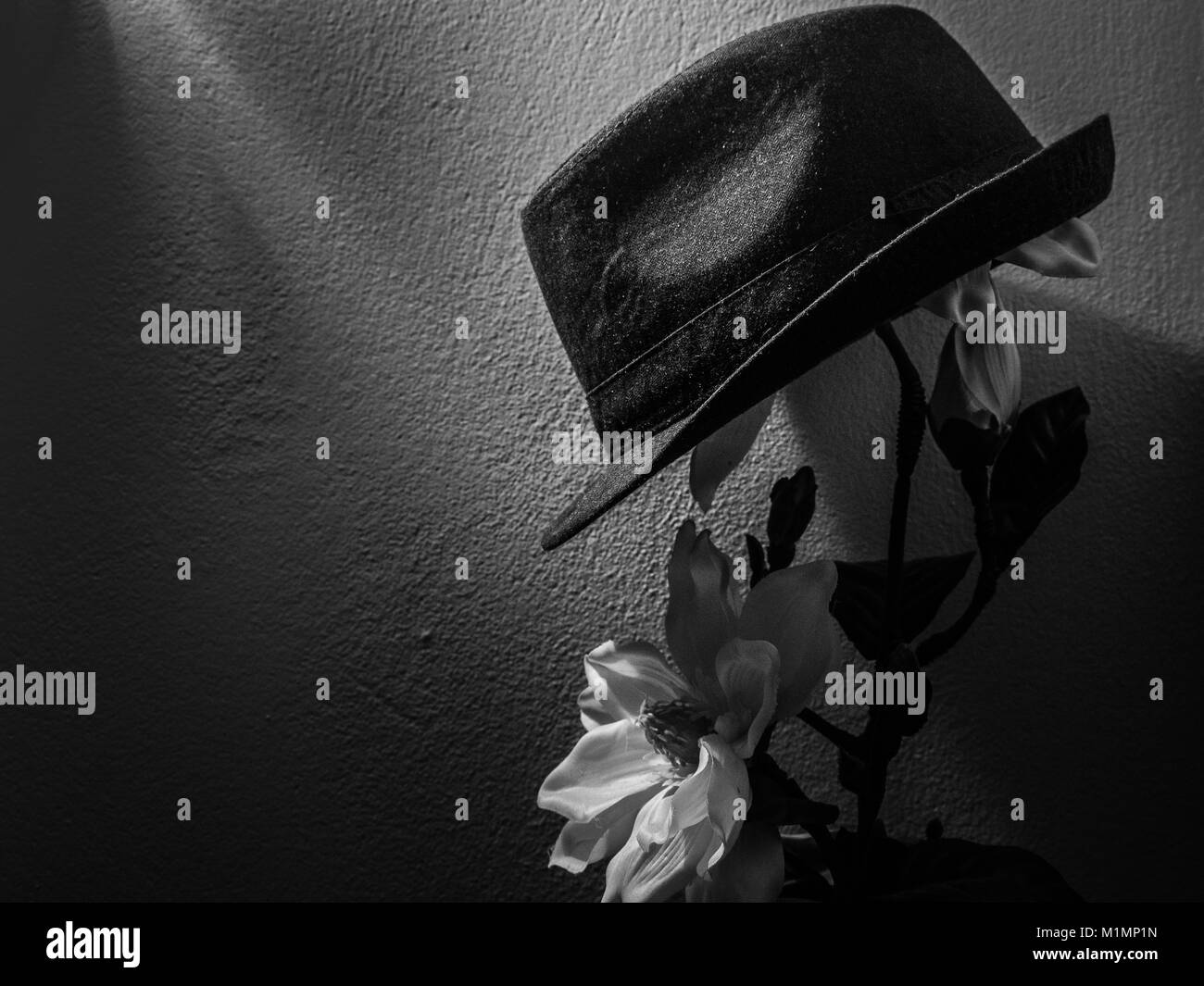 Gentleman mit Hut und Blume Artwork Stockfoto