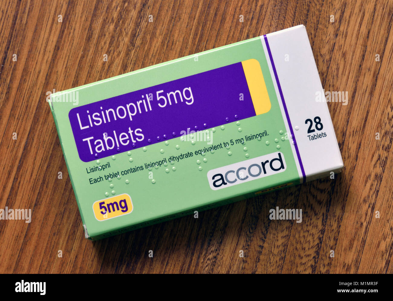 Packung mit 28 Lisinopril 5mg Tabletten. Jede Tablette enthält lisinopril Dihydrat entspricht 5 mg Lisinopril. Accord. Stockfoto