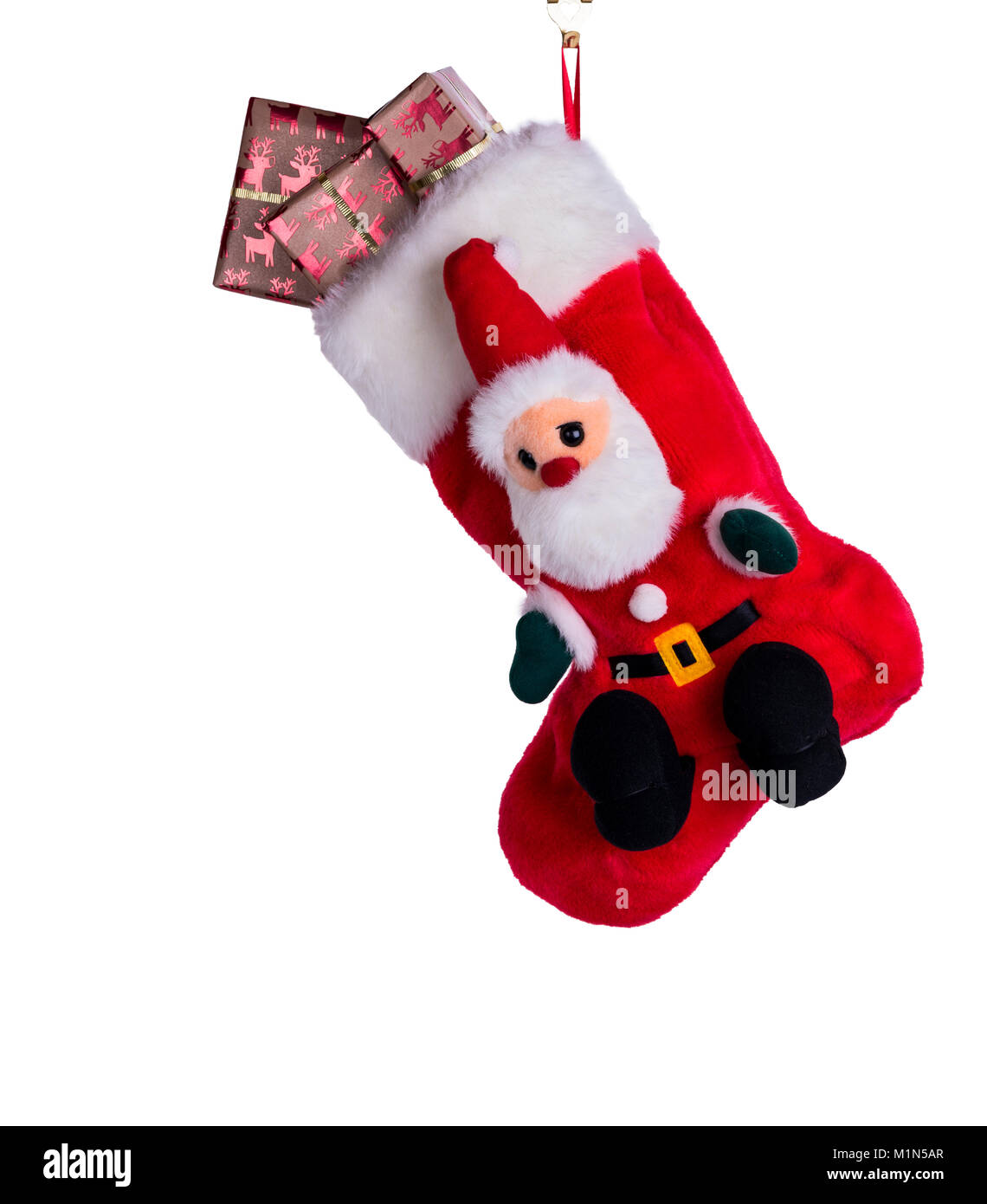 Traditionelle Weihnachten oder Xmas Stocking, mit Geschenk eingepackten Geschenke oder Geschenke gefüllt. Stockfoto