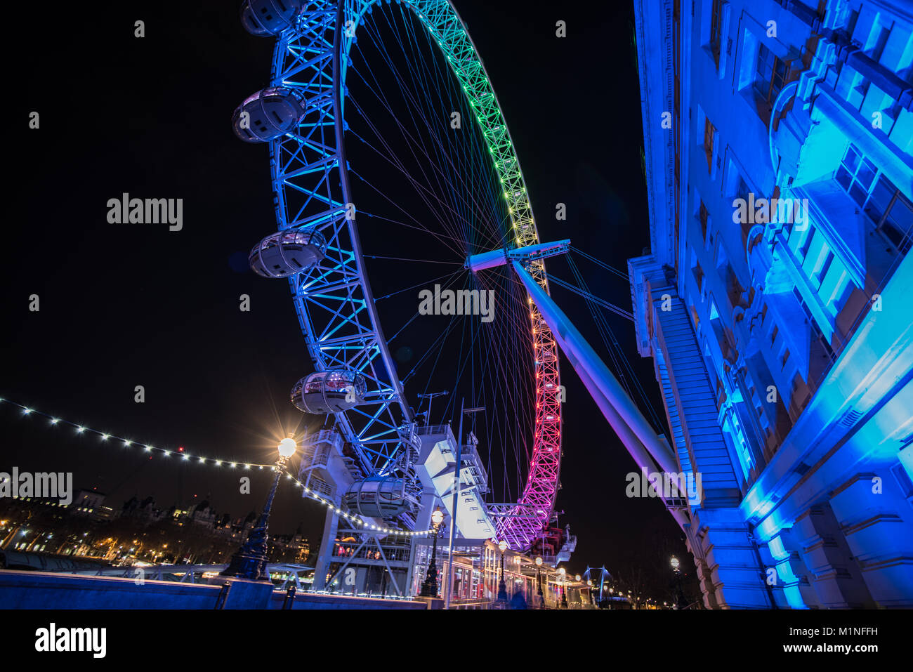 London Eye bei Nacht Stockfoto