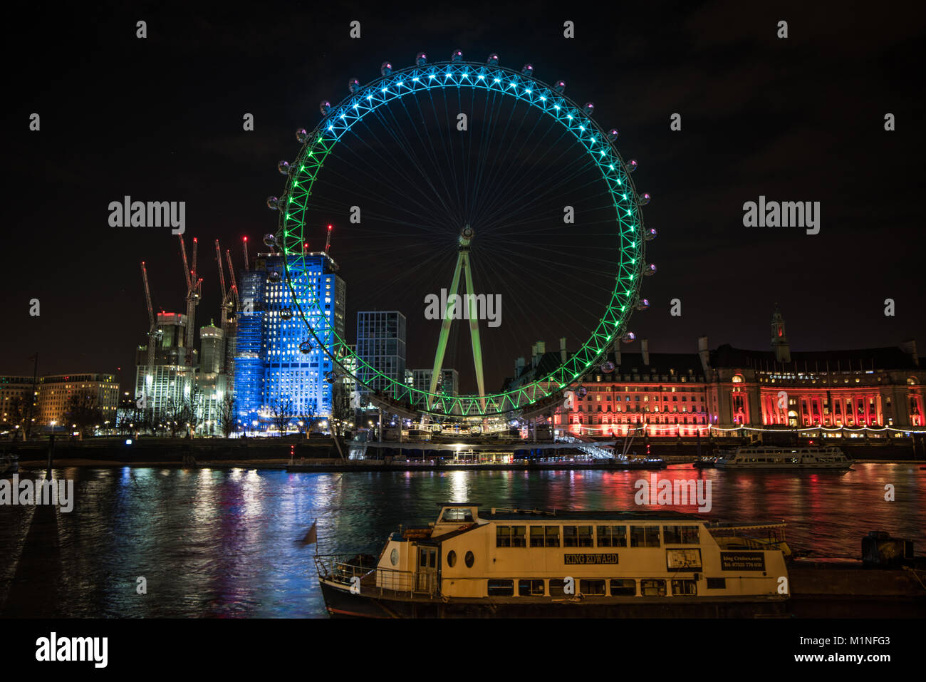 London Eye bei Nacht Stockfoto