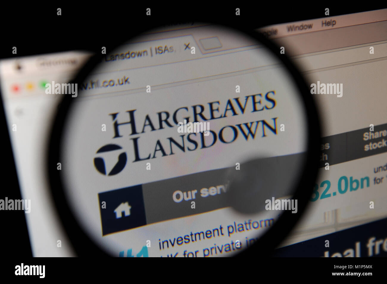 Die hargreaves Lansdown Website durch ein Vergrößerungsglas gesehen Stockfoto