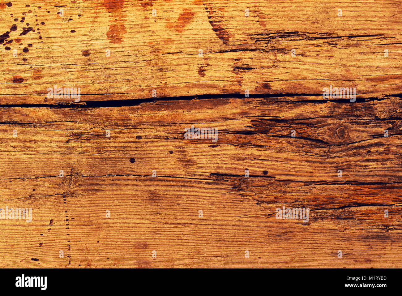 Grobe alten rustikalen Holzbrett Muster Textur mit Rissen ideal für Grunge-Stil-Hintergründe Stockfoto