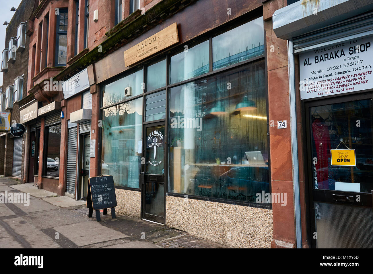 Lagom Küche und Ovenbird Kaffeeröster in der Victoria Street in Glasgow, UK Stockfoto