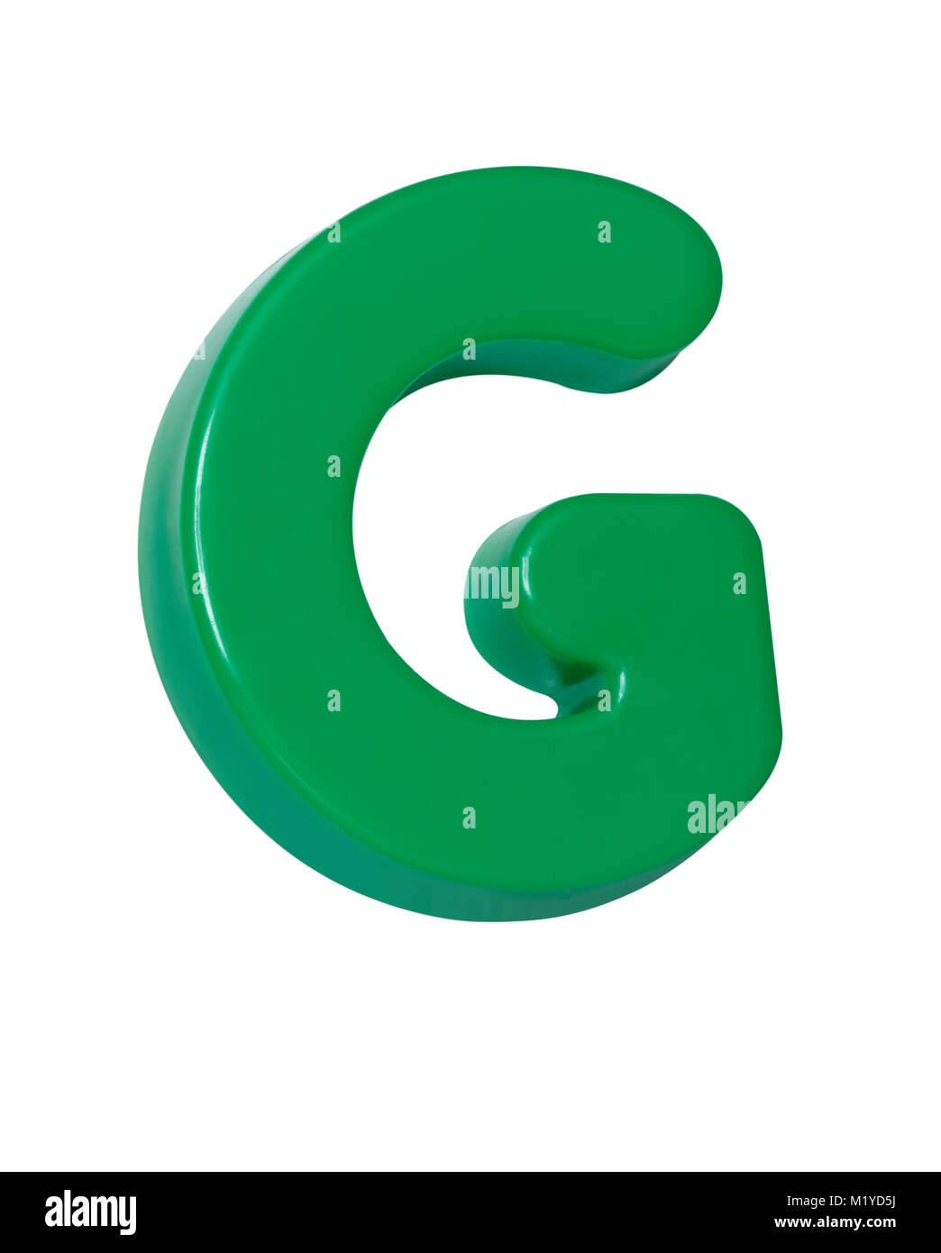 Ein ausgeschnittenes geschossen von einem grünen Kunststoff Buchstabe 'G' Stockfoto