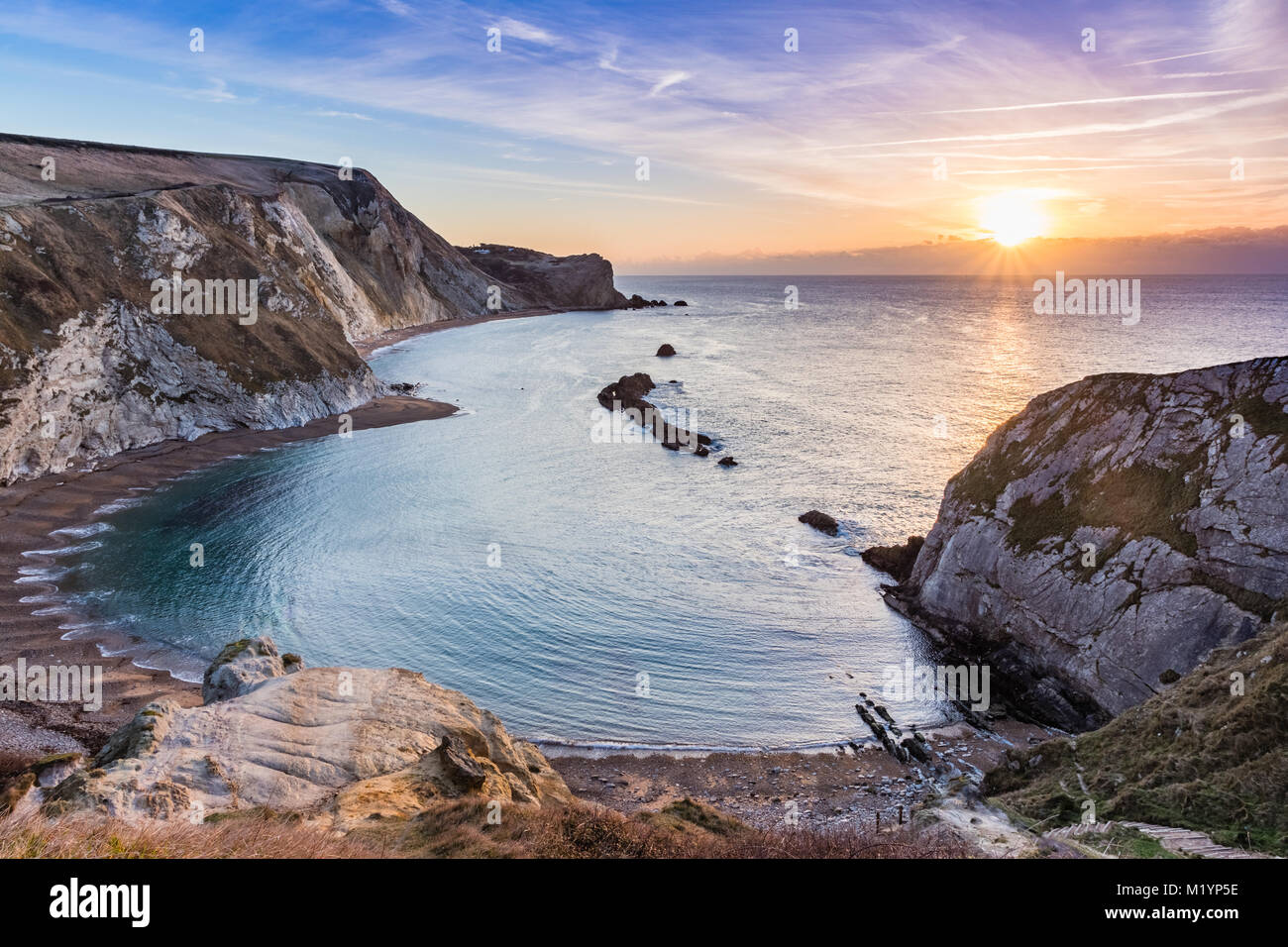 Mann-O Krieg Bay Sunrise, Dorset, Stockfoto