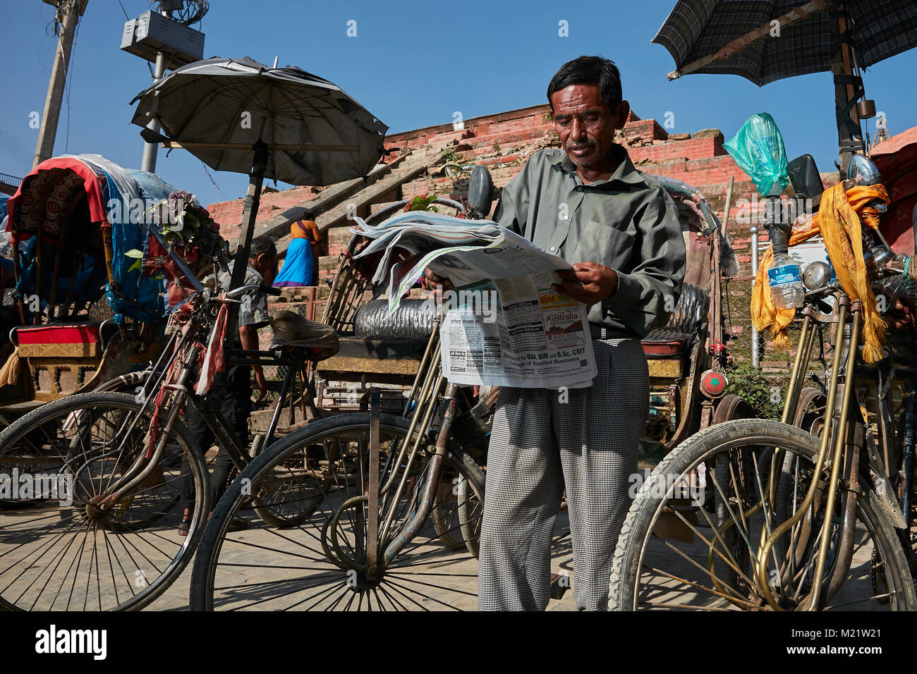 Nepalesische Rikscha Fahrer am Durbar Square, Kathmandu, Nepal Stockfoto