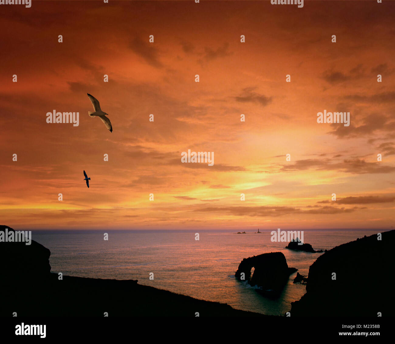 De - CORNWALL: Atlantic Sonnenuntergang über Lands End Stockfoto