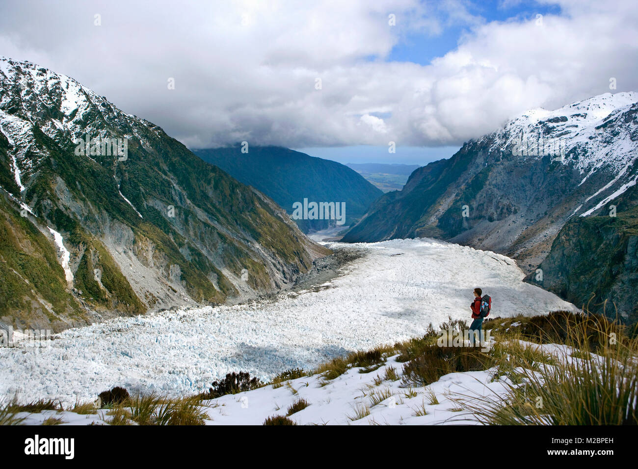 Neuseeland, Südinsel, Fox Glacier, Touristische, Trekking bei Bundeskanzler Hütte. Unesco-Weltkulturerbe. Stockfoto