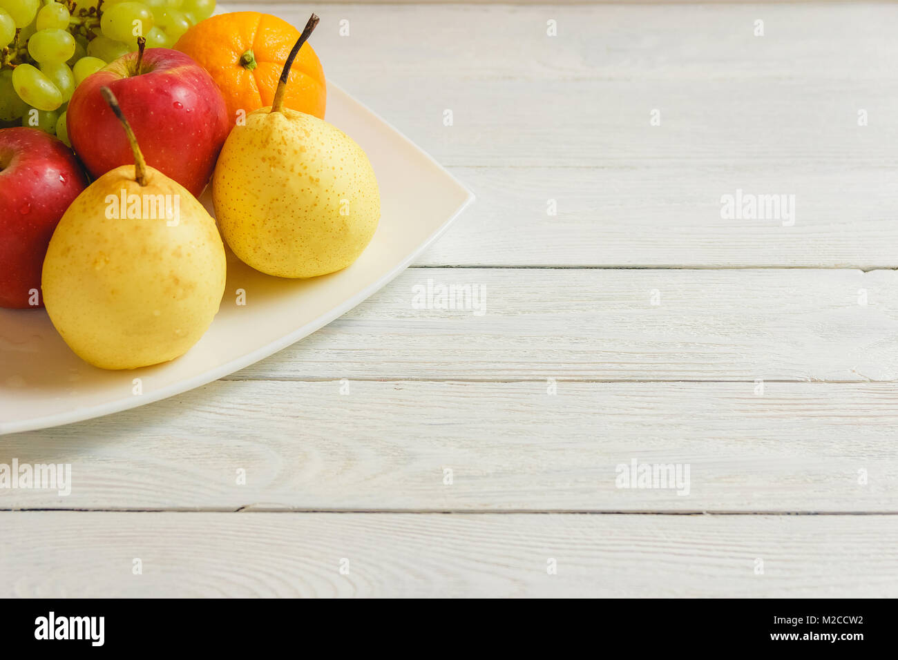 Gesunde Frucht Mix auf der hölzernen Küchentisch mit Kopie Raum Stockfoto