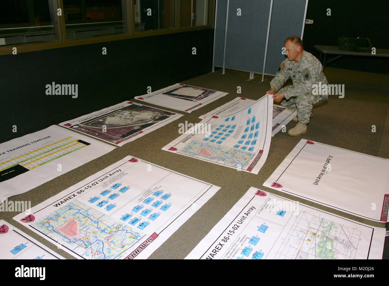 Ein Mitglied der 86th Abteilung Weiterbildung, Plakat, das in der Gemeinsamen Visitors Bureau in Gebäude 220 Am 20. April 2015 verwendet werden, für Übungen am Fort McCoy, Wis (U.S. Armee Stockfoto