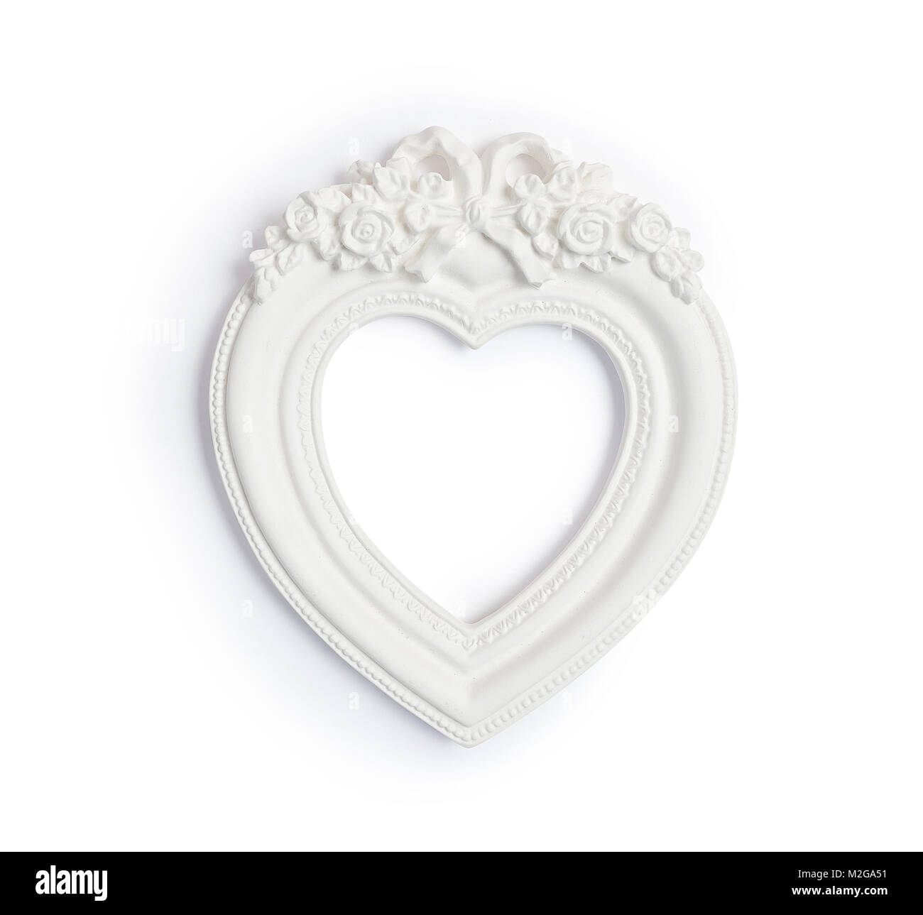 Vintage klassischen weißen Rahmen in Form von Herzen auf weißem Hintergrund Stockfoto