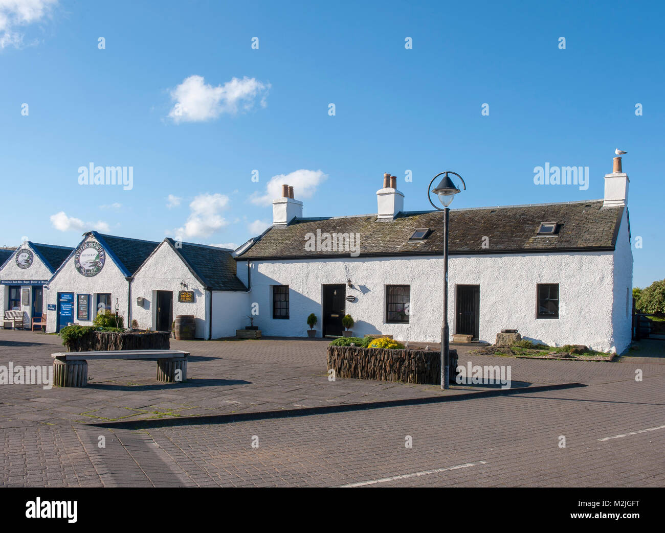 Oyster Brauerei und Ferienhäusern Seil Insel schottischen Inseln Stockfoto