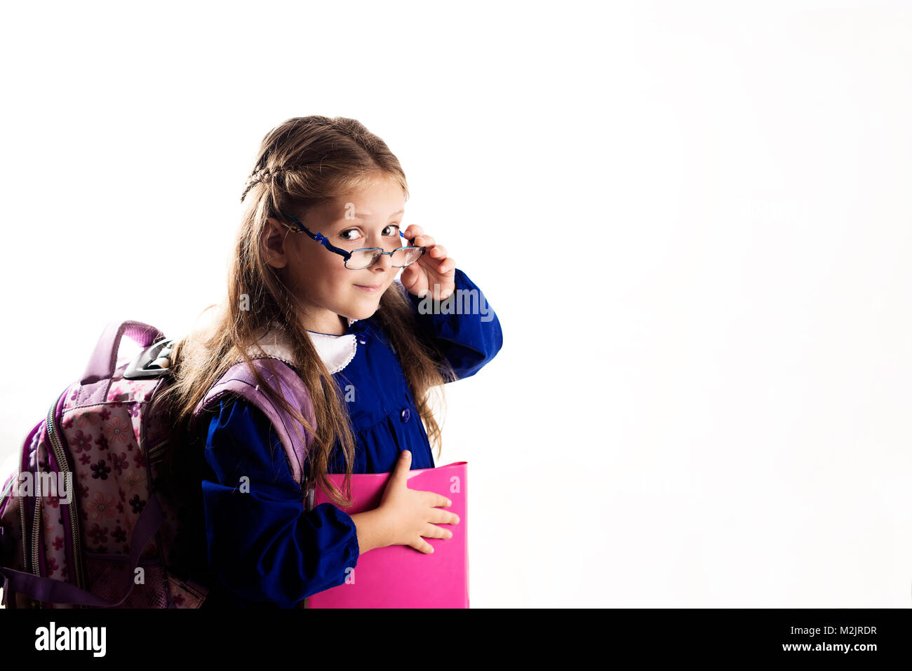 Kaukasische elementare Alter Schulmädchen mit Brille Stockfoto