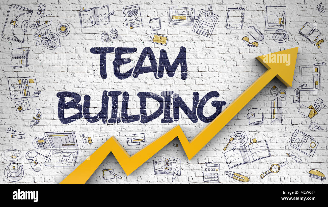 Team Building auf weißen Brickwall. Stockfoto