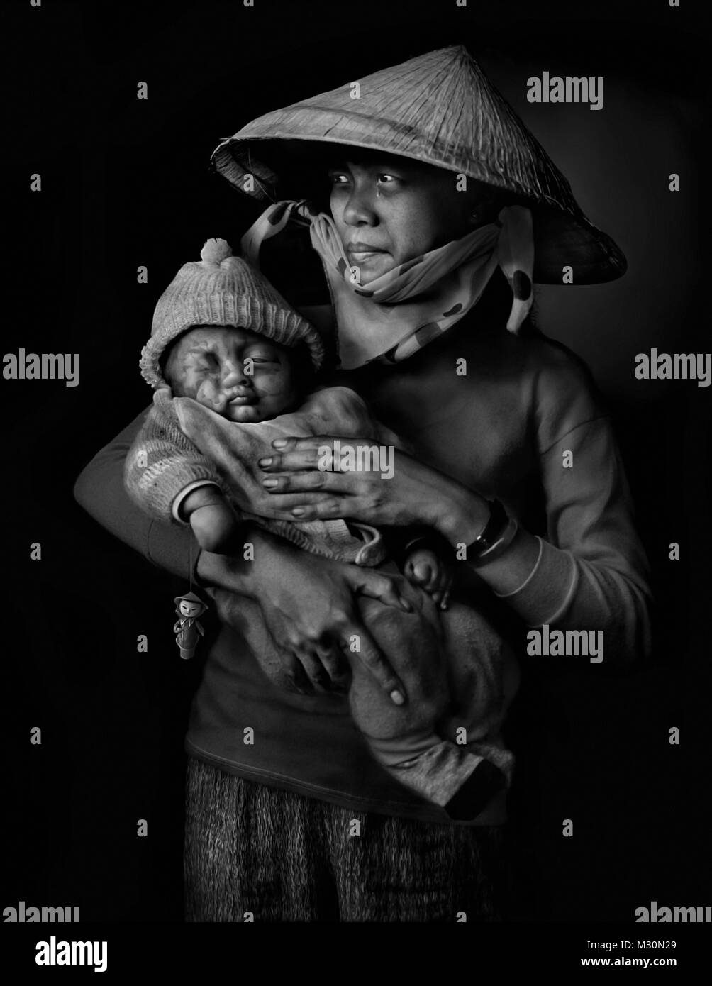 Mutter mit Baby in Hanoi, Vietnam, Indochina, Asien Stockfoto