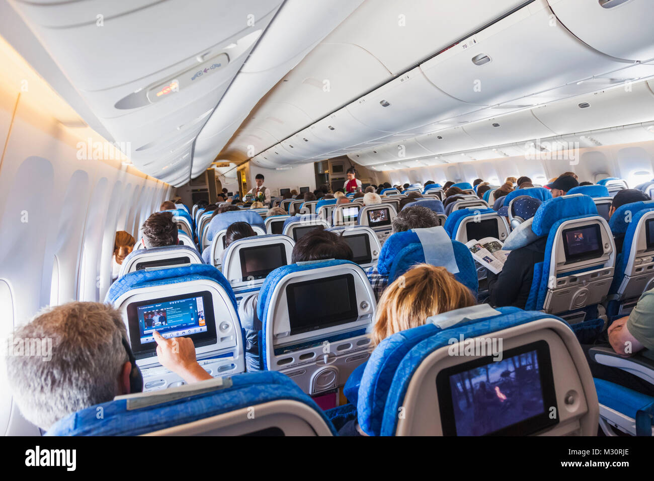 Flugzeug und Passagiere an Bord Kabine Stockfoto