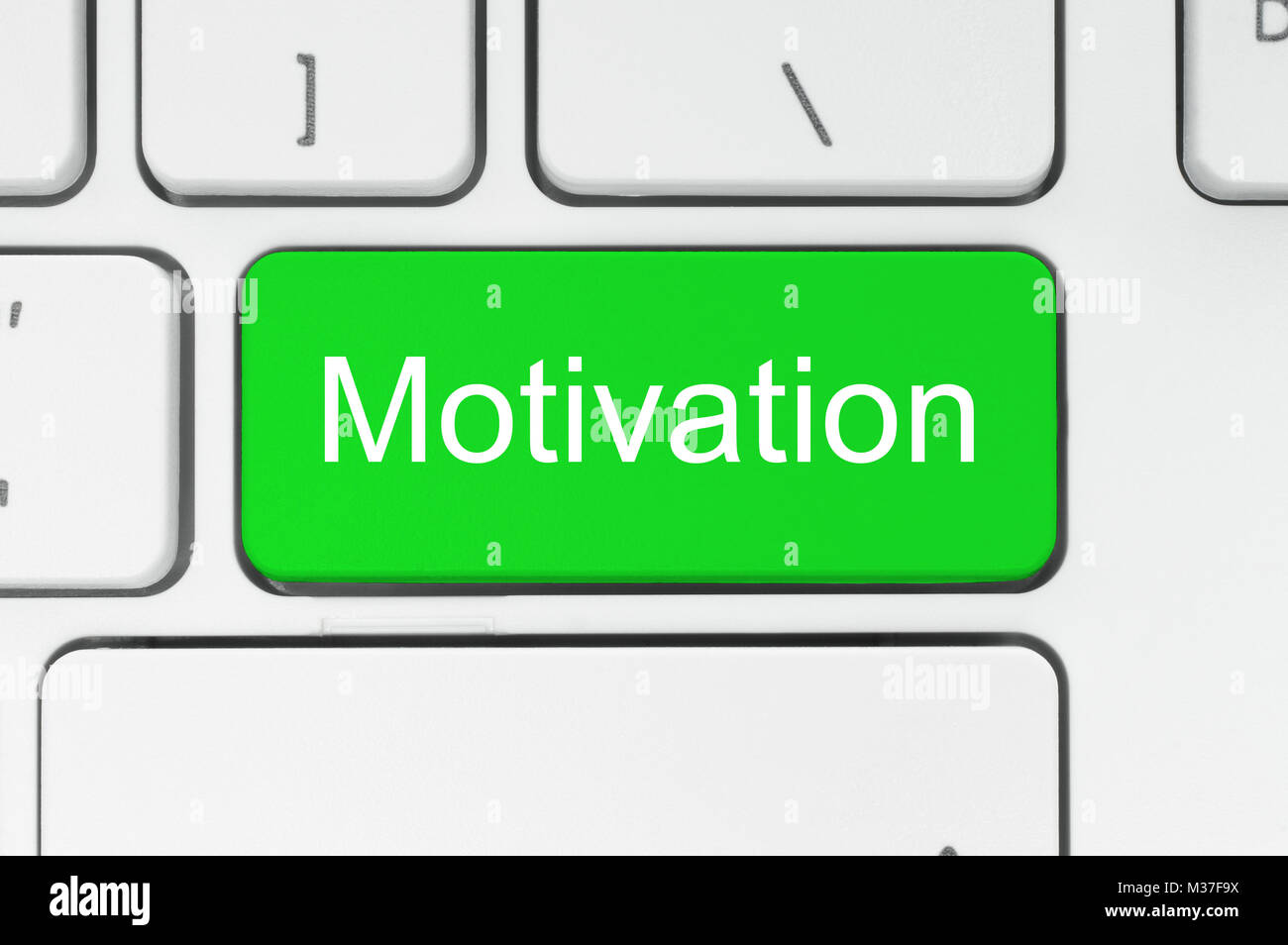 Grüne Taste mit Motivation Wort auf der Tastatur close-up Stockfoto