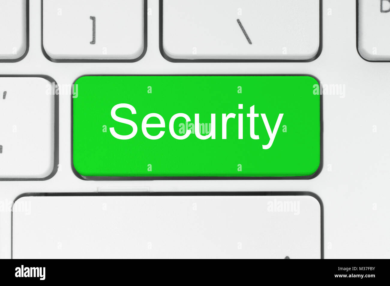 Grüne Taste mit Sicherheit Wort auf der Tastatur close-up Stockfoto