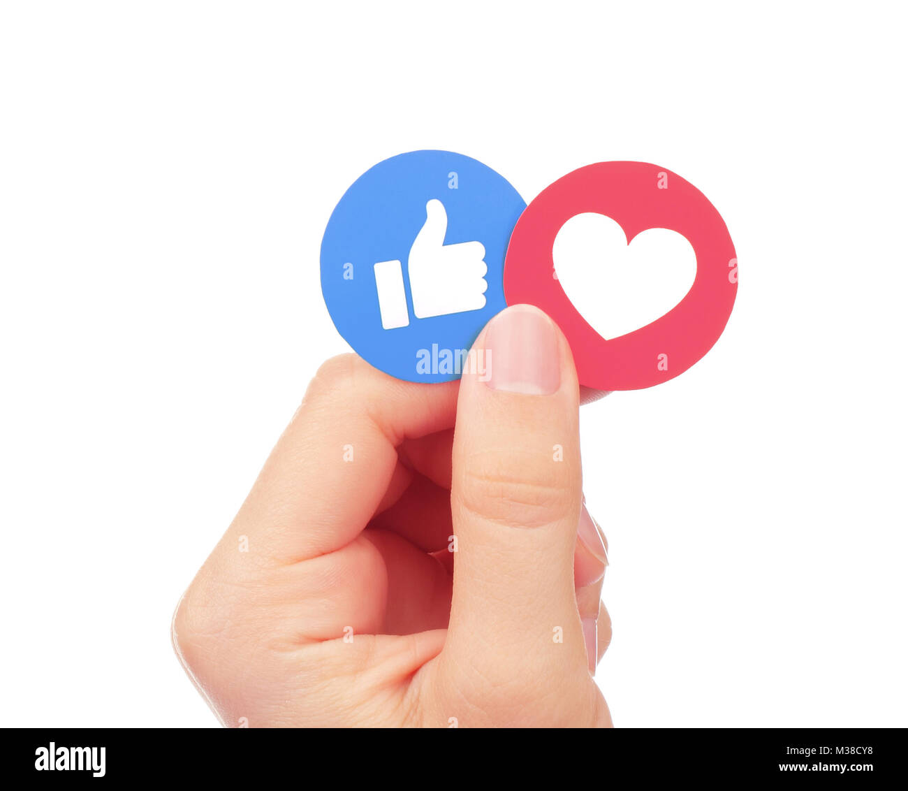 Kiew, Ukraine - September 04, 2017: Hand hält wie Facebook und die Liebe einfühlsame Emoji Reaktionen, die auf Papier gedruckt. Facebook ist ein bekannter Social ne Stockfoto