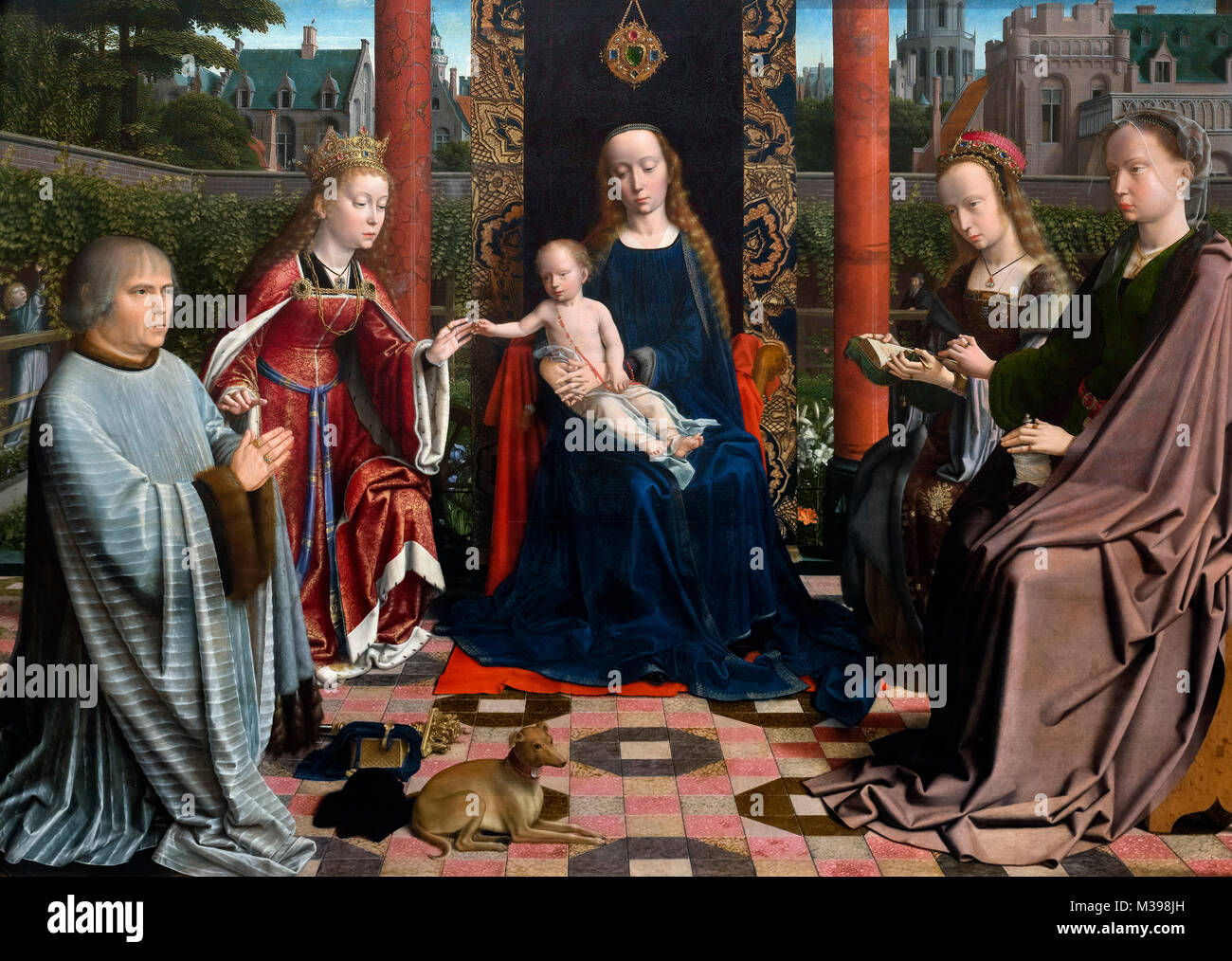 Jungfrau und Kind mit Heiligen und Spender von Gerard David (1460-1523), Öl auf Eichenholz, c1510. Gerard David war einer der ersten niederländischen Künstler und sein Werk ist als flämische Primitive eingestuft. Stockfoto