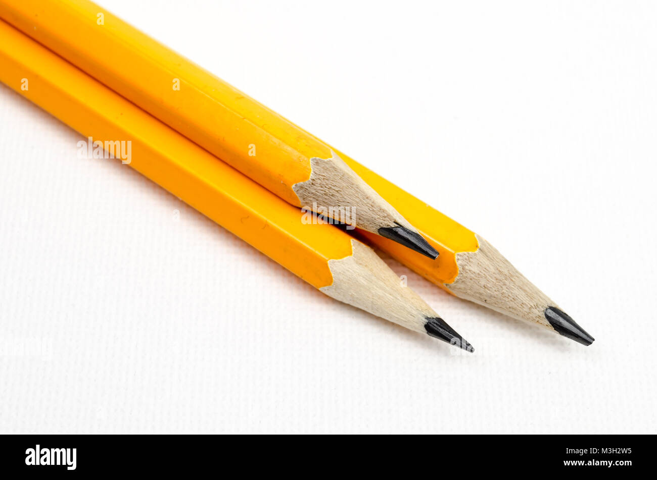 Ein Studio Foto von 3 Orange Bleistifte Stockfoto