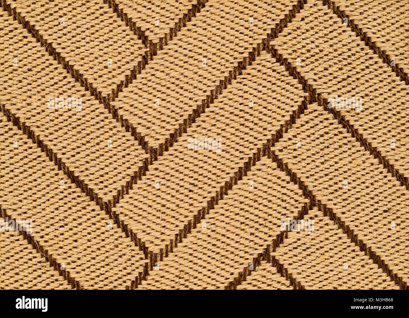 Hand gebunden komplizierten Muster gewebt geknotet Sisal Dreidimensionale Wolldecke Detail. Stockfoto