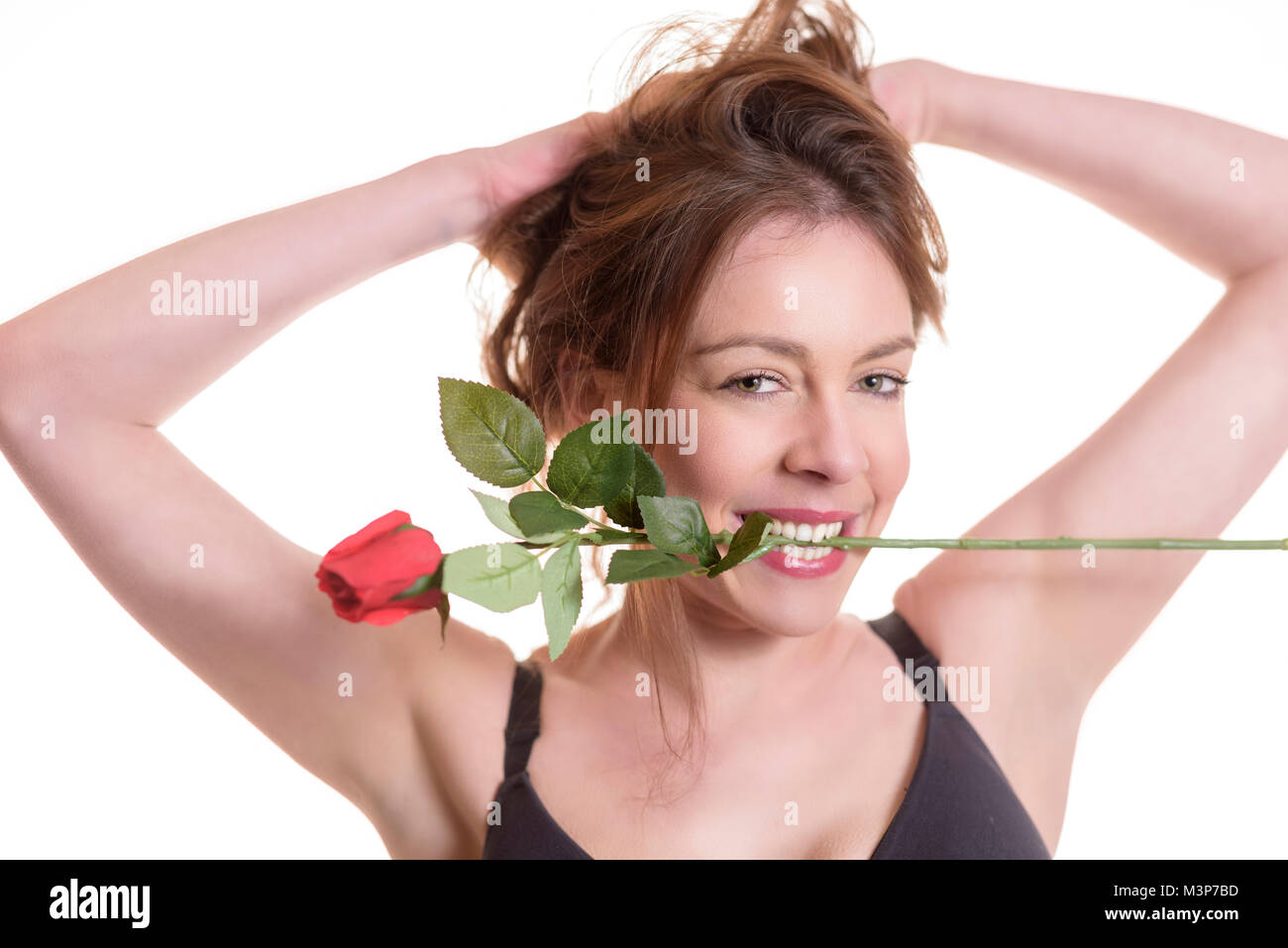 Valentine. Lady beißen red rose Stockfoto