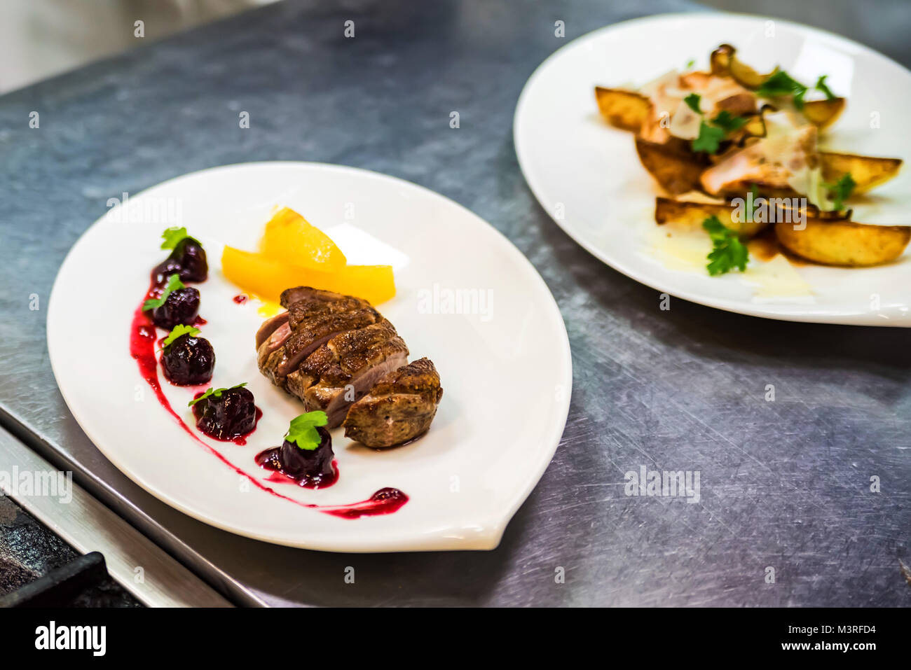 Lecker Steak auf dem Teller am Kochen workshop Stockfoto