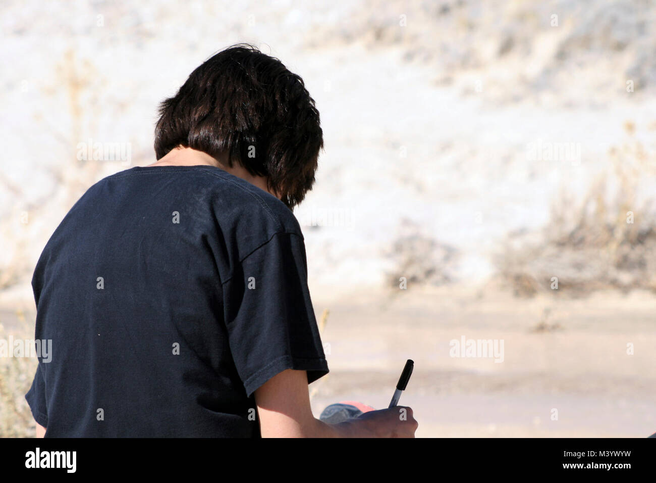 Ein Student arbeitet auf seine Art Journal Stockfoto