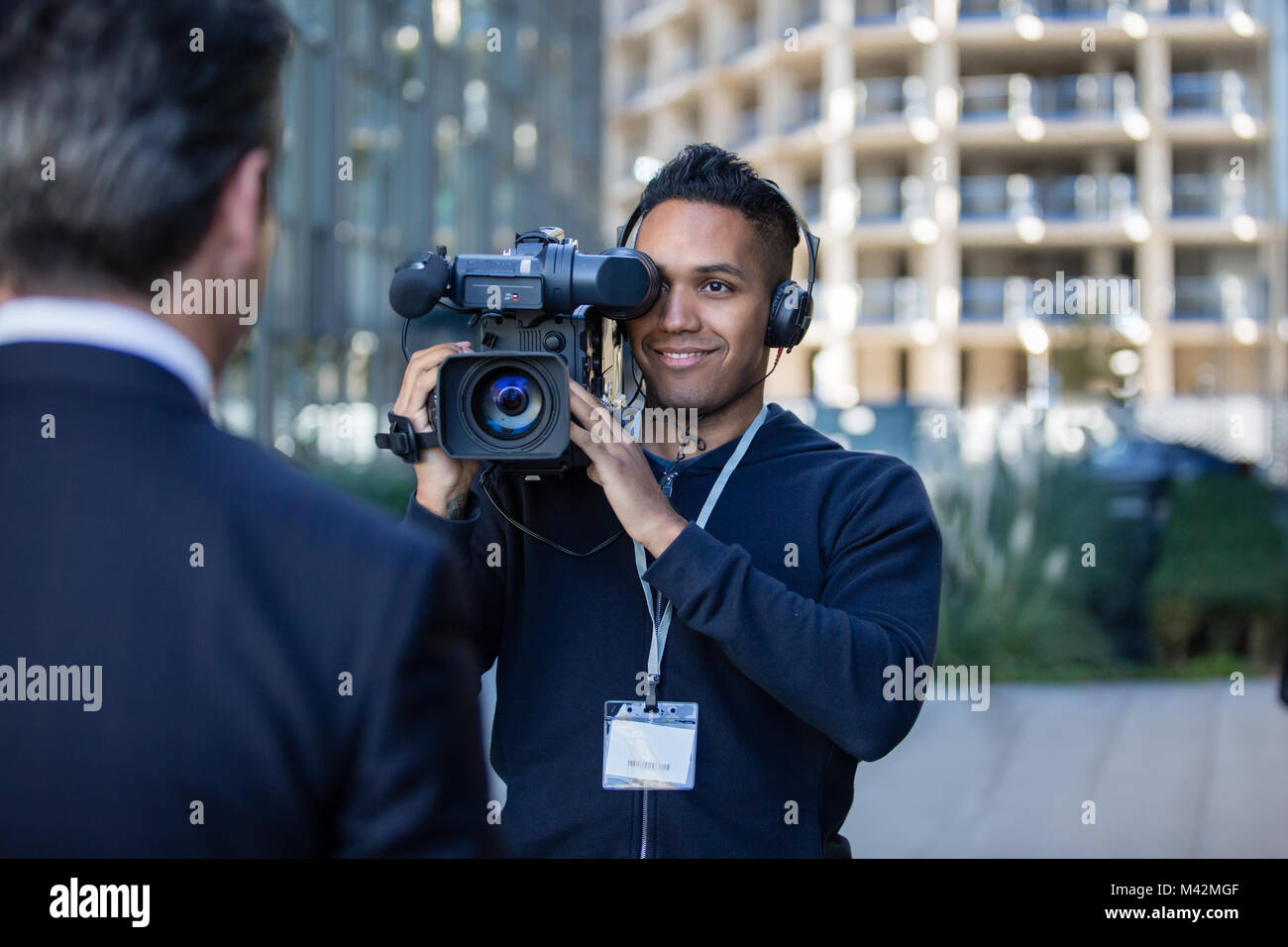 Kameramann filmen für Media Broadcasting Stockfoto