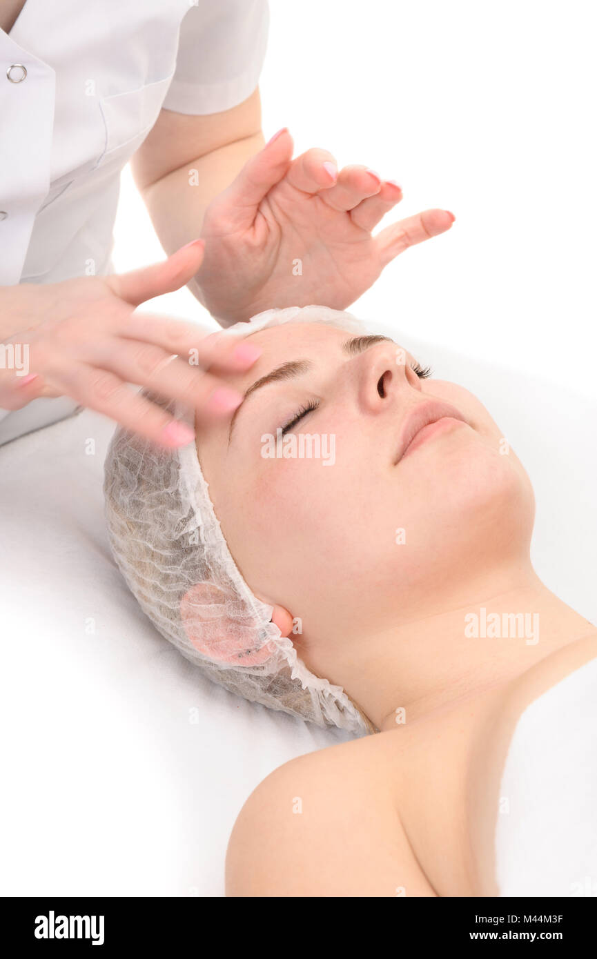 Gesichtsmassage mit Peeling-Maske Stockfoto