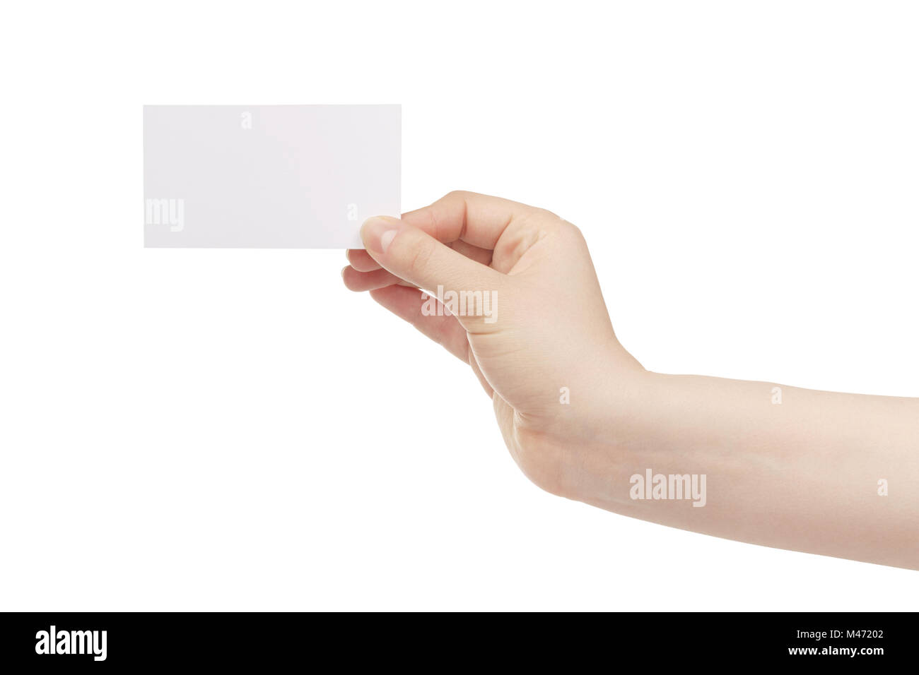 junge weibliche linke Hand halten leere weiße Papier-Karte Stockfoto