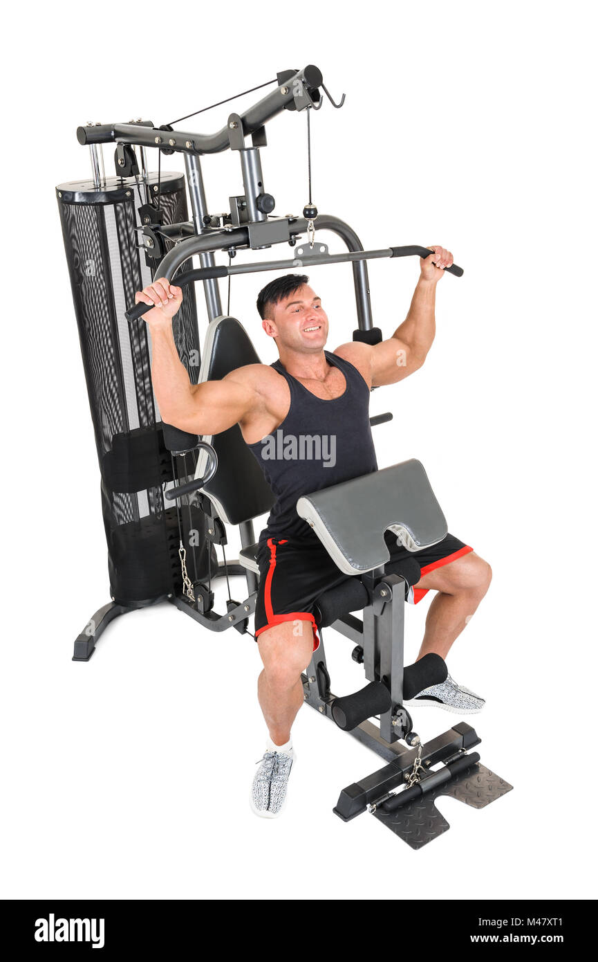 Hübscher junger Mann dabei seitliche Pulldown-Training isoliert auf weiss Stockfoto