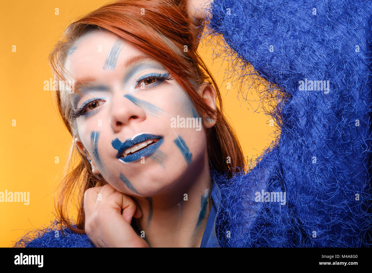 Hübsche, rothaarige/Ingwer, junge Frau mit verrückten Make-up © Jeremy Graham-Cumming Stockfoto