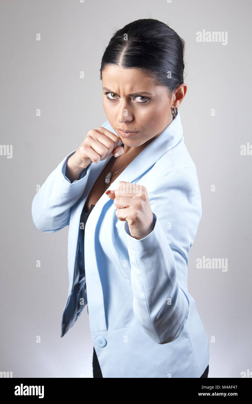 Business woman bereit zu kämpfen Stockfoto