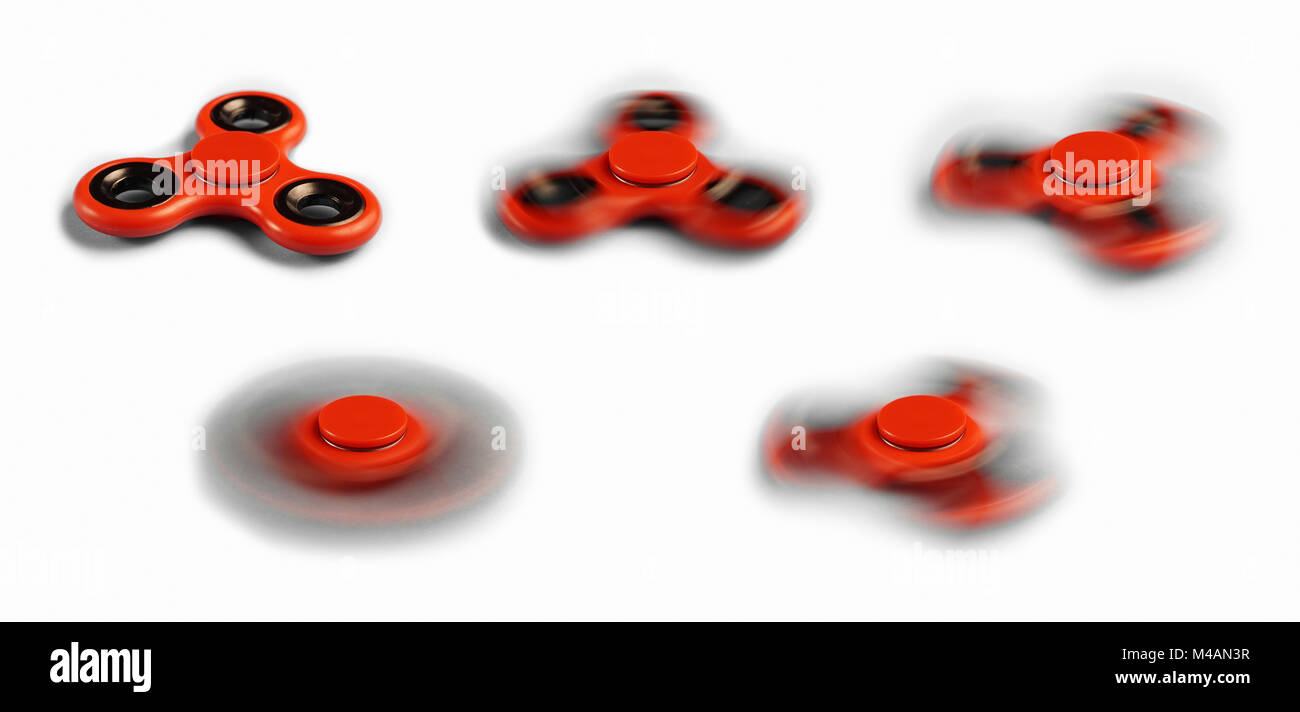 Fidget Spinner in verschiedenen verschiedenen Schleuderdrehzahlen auf weißem Hintergrund. Stockfoto